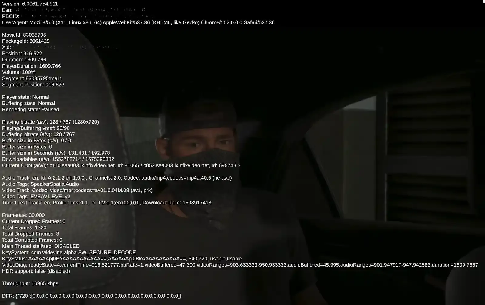 Netflix diagnostic overlay of white monospace statistics over a paused dark film scene, showing a playing bitrate of 767 kbps at 1280x720.
